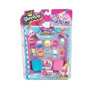Shopkins - Pack de 12 Shopskins + 2 Livres (mod&egrave;le al&eacute;atoire)