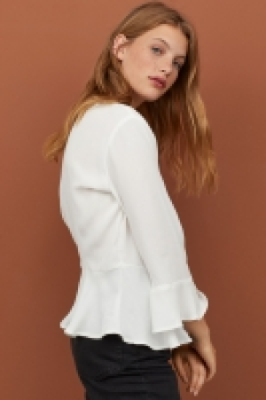  Blouse à encolure en V 11.99 €