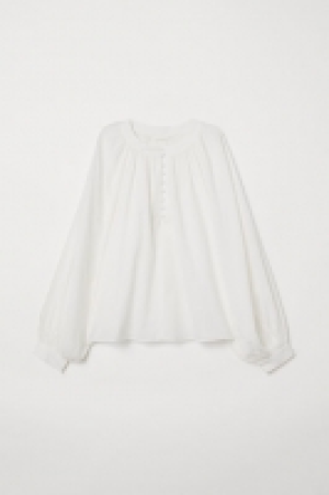  Blouse à manches ballon 11.99 €