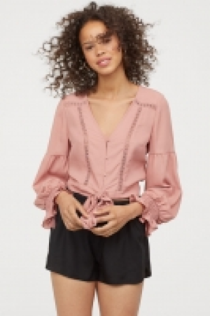  Blouse à encolure en V 14.99 €
