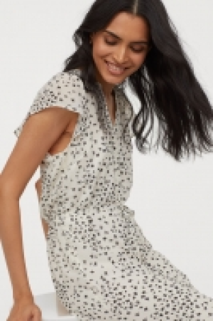 Robe avec ceinture à nouer 23.99 €