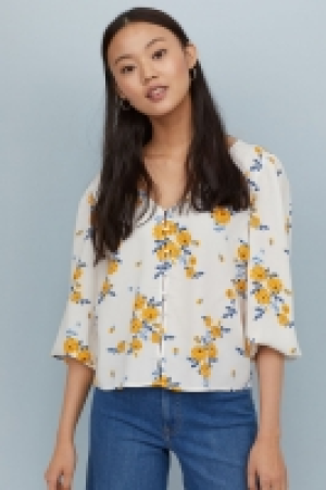  Blouse à encolure en V 7.99 €
