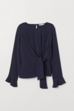  Blouse avec détail noué 17.99 €