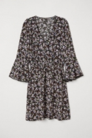  Robe à encolure en V 7.99 €