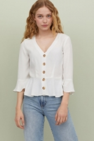  Blouse volantée 12.99 €