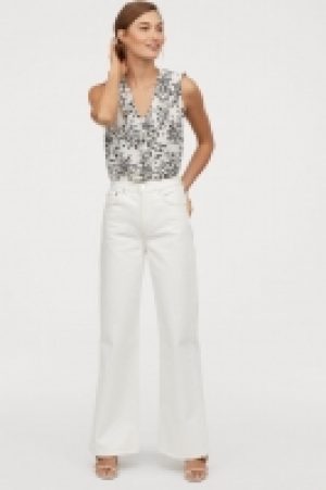  Blouse sans manches volantée 14.99 €