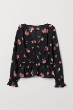  Blouse avec détail noué 12.99 €