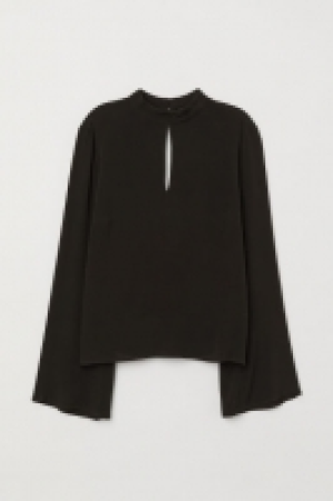  Blouse à manches trompette 11.99 €