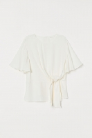  Blouse avec détail noué 14.99 €