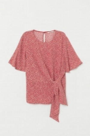  Blouse avec détail noué 16.99 €