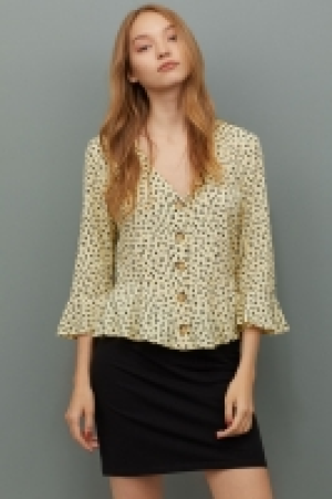  Blouse à encolure en V 12.99 €