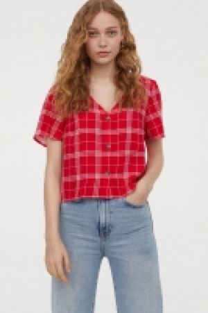  Blouse à encolure en V 6.99 €