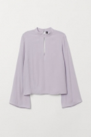  Blouse à manches trompette 12.99 €