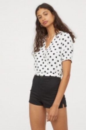  Blouse croisée 11.99 €