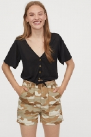  Top court avec détail noué 7.99 €