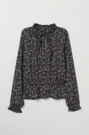  Blouse avec col à nouer 7.99 €