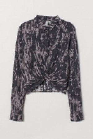  Blouse avec détail noué 9.99 €