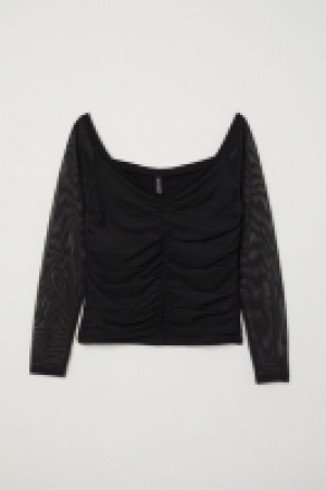  Top épaules nues en mesh 10.99 €