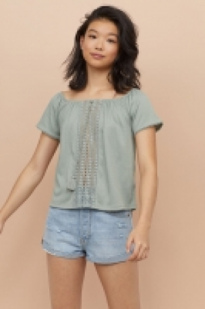  Blouse épaules nues 9.99 €