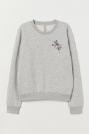  Sweat avec applications 18.99 €