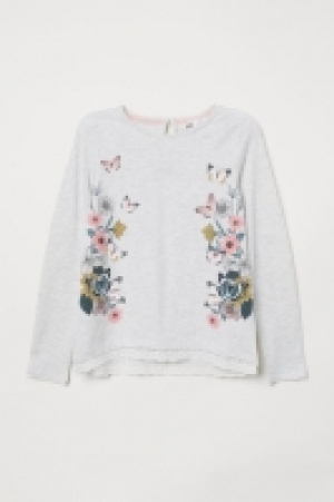 Top en jersey avec dentelle 7.99 €