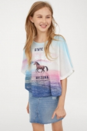  Top imprimé façon poncho 6.99 €