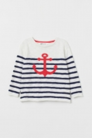  Pull en maille flammée 9.99 €