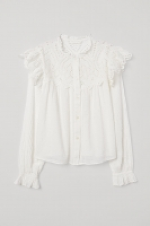  Blouse avec broderie anglaise 23.99 €