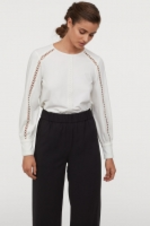  Blouse avec dentelle 19.99 €