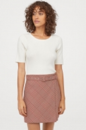  Jupe avec ceinture 19.99 €