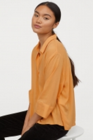  Chemise à encolure en V 7.99 €