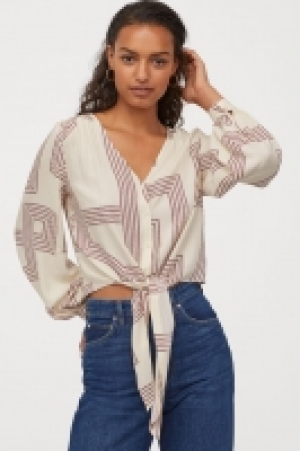  Blouse imprimée à nouer 12.99 €