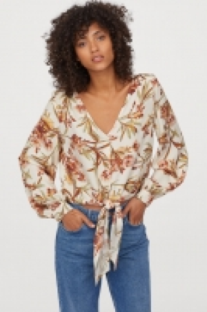  Blouse imprimée à nouer 9.99 €