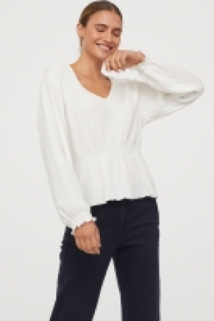  Top smocké à encolure en V 8.99 €