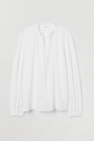  Blouse en plumetis de coton 18.99 €
