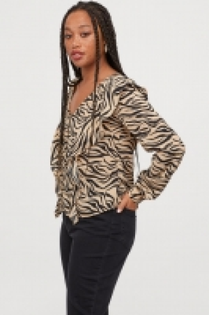  Blouse volantée 9.99 €