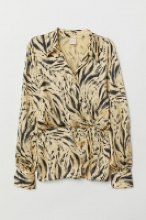  Blouse à effet croisé avec col 18.99 €