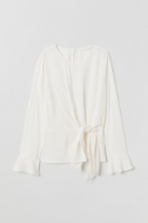  Blouse avec détail noué 18.99 €