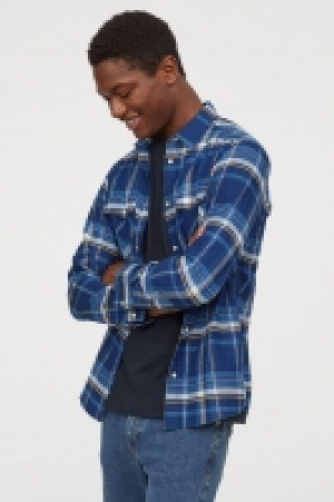  Chemise à carreaux en coton 12.99 €