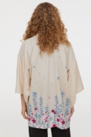  Kimono avec impression 12.99 €
