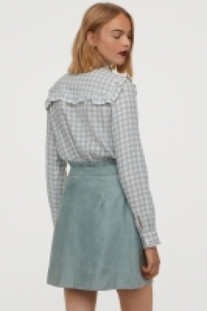  Blouse à volants 20.99 €