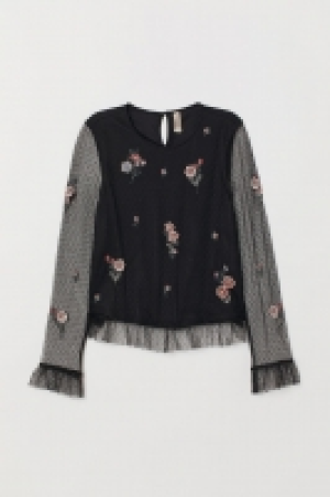  Top brodé 12.99 €