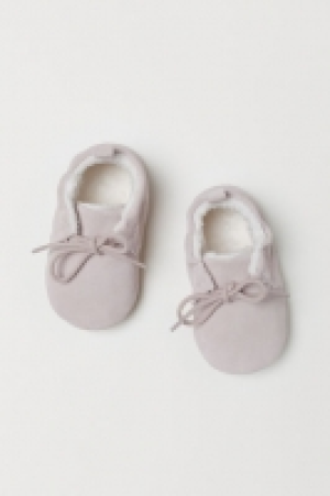  Chaussons en suède 9.99 €