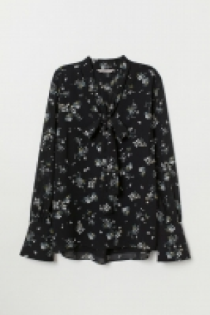  Blouse avec col à nouer 14.99 €