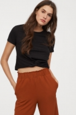  Top avec détail noué 3.99 €