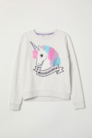  Sweat avec applications 6.99 €