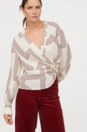  Blouse avec détail noué 13.99 €