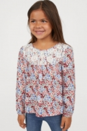  Blouse avec dentelle 9.99 €