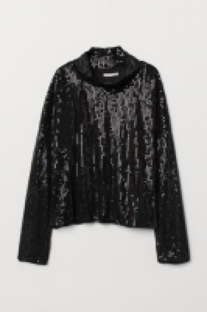  Top à paillettes 14.99 €