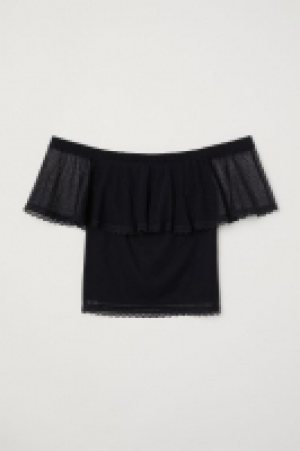  Top en mesh à pois 6.99 €